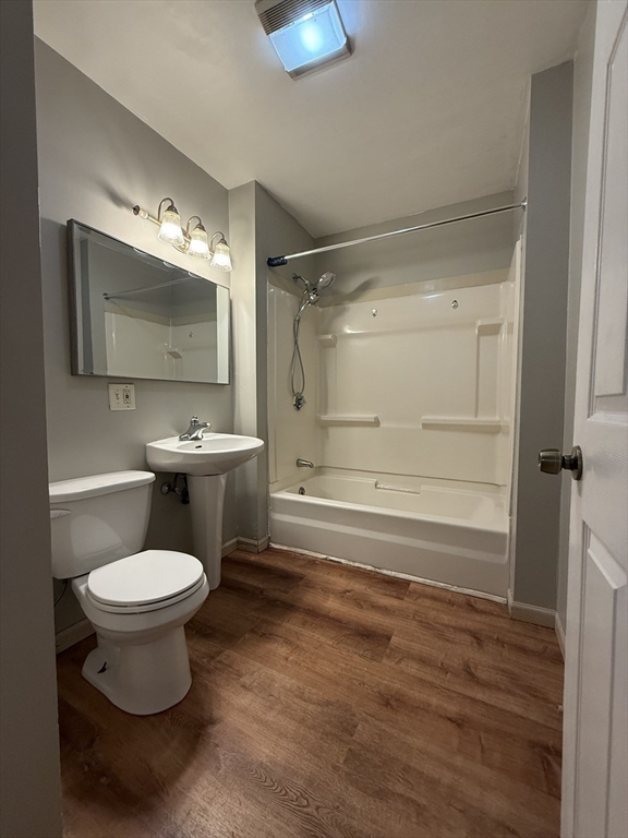 41 Holland Road, Unit 1 Worcester, MA 01603 - Photo 13 of 16 a bathroom with a toilet sink and shower