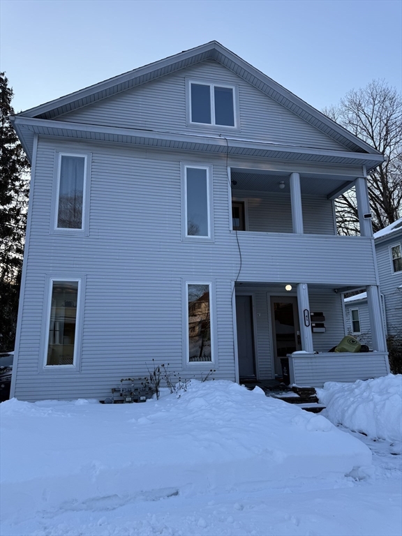 41 Holland Road, Unit 1 Worcester, MA 01603 - Photo 16 of 16 a view of a house with a yard and garage