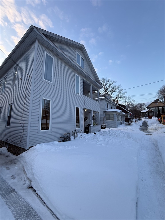 41 Holland Road, Unit 1 Worcester, MA 01603 - Photo 2 of 16 a front view of a house with a yard