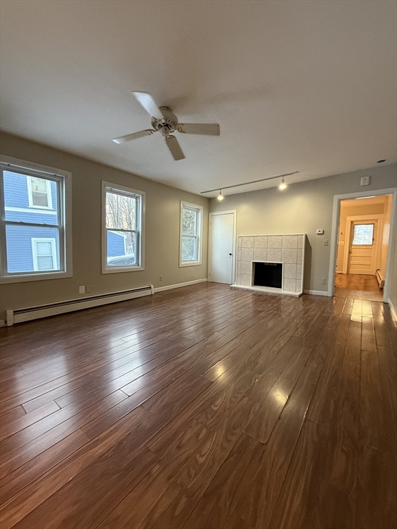41 Holland Road, Unit 1 Worcester, MA 01603 - Photo 4 of 16 a view of a livingroom with wooden floor and window