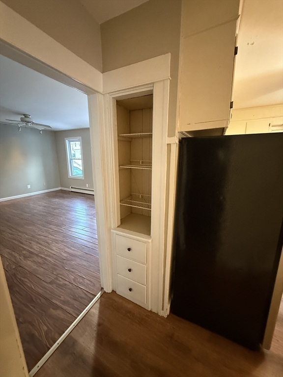 41 Holland Road, Unit 1 Worcester, MA 01603 - Photo 7 of 16 wooden floor in an empty room with a window