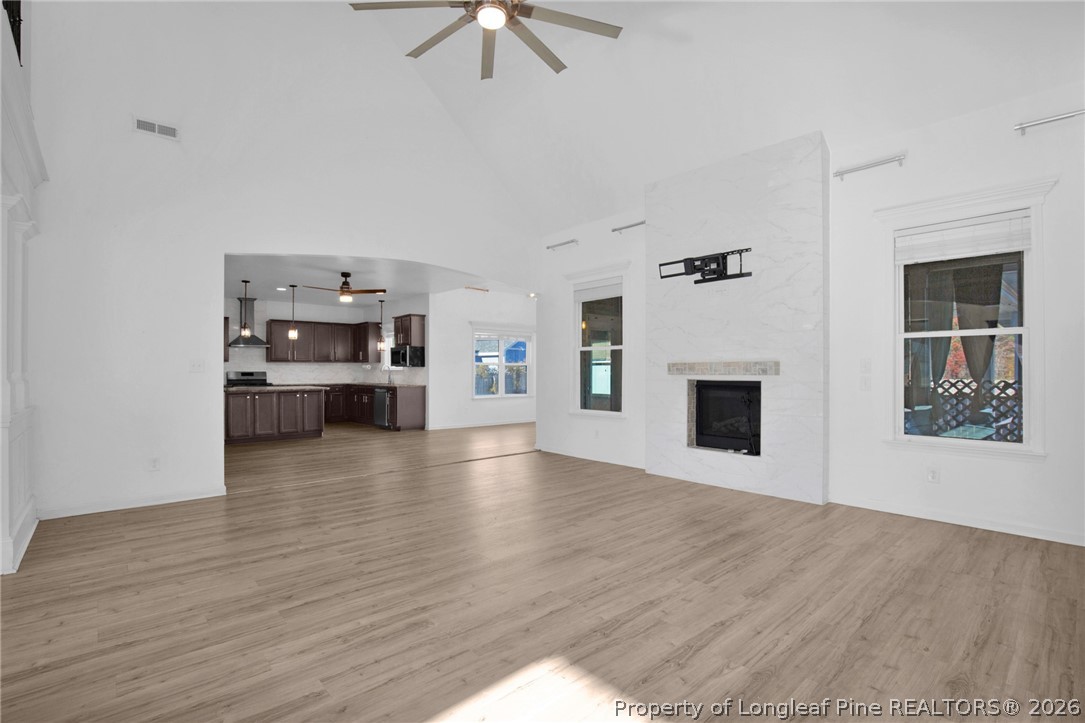 2145 Harrington Road Fayetteville, NC 28306 - Photo 14 of 50 a view of kitchen with cabinets and wooden floor