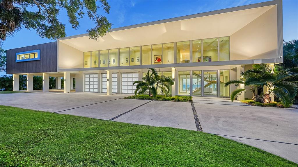 4123 Bay Shore Road Sarasota, FL 34234 - Photo 1 of 29 front view of house with a yard
