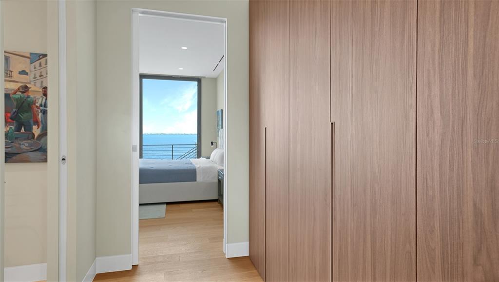 4123 Bay Shore Road Sarasota, FL 34234 - Photo 13 of 29 a bedroom with a bed and a view of bedroom