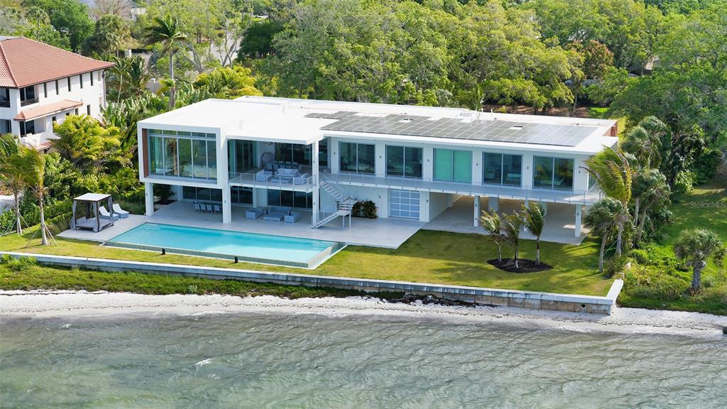4123 Bay Shore Road Sarasota, FL 34234 - Photo 24 of 29 a view of house with outdoor space and large trees