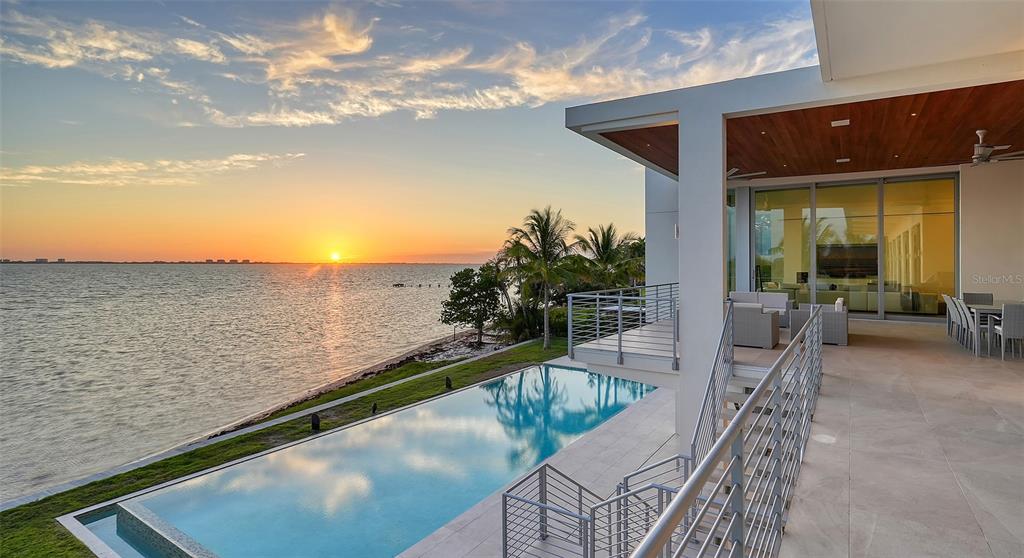 4123 Bay Shore Road Sarasota, FL 34234 - Photo 27 of 29 a view of a balcony with an ocean view