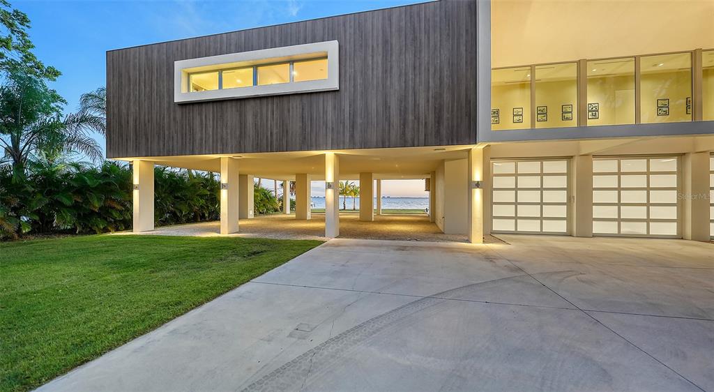 4123 Bay Shore Road Sarasota, FL 34234 - Photo 29 of 29 a view of a building with a yard