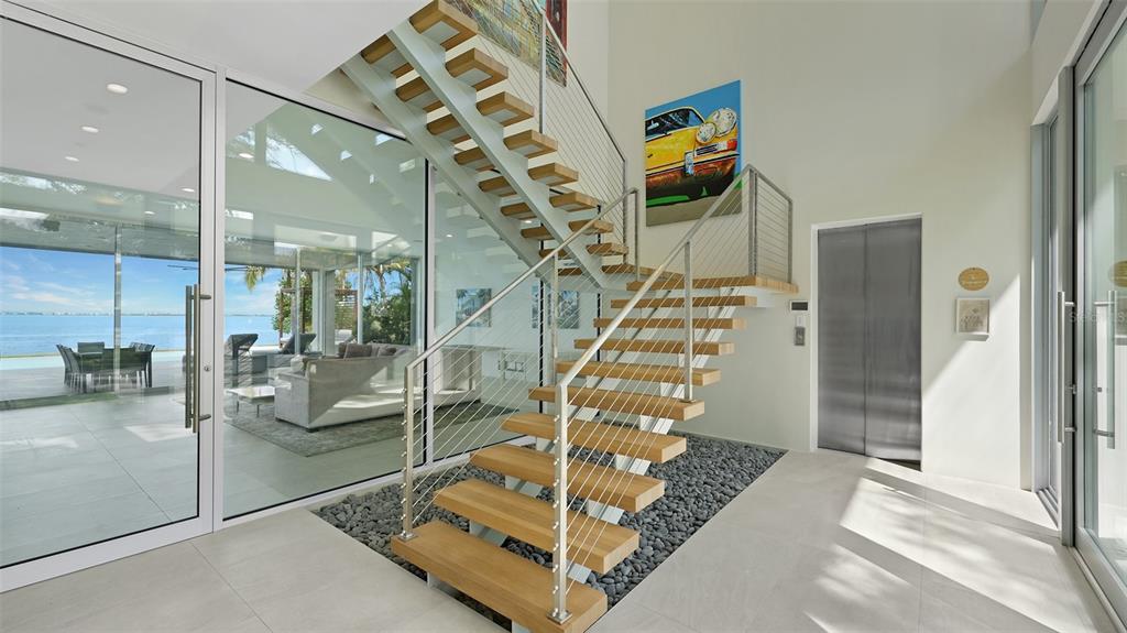 4123 Bay Shore Road Sarasota, FL 34234 - Photo 4 of 29 a view of an entryway with livingroom and furniture