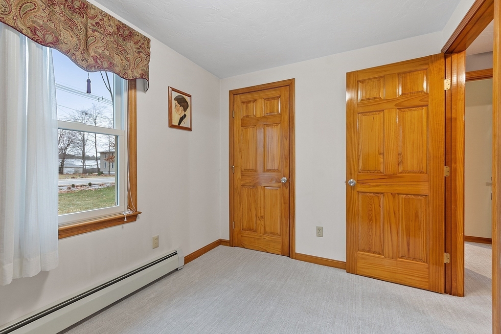 27 Lancaster Road Shirley, MA 01464 - Photo 21 of 41 an empty room with windows