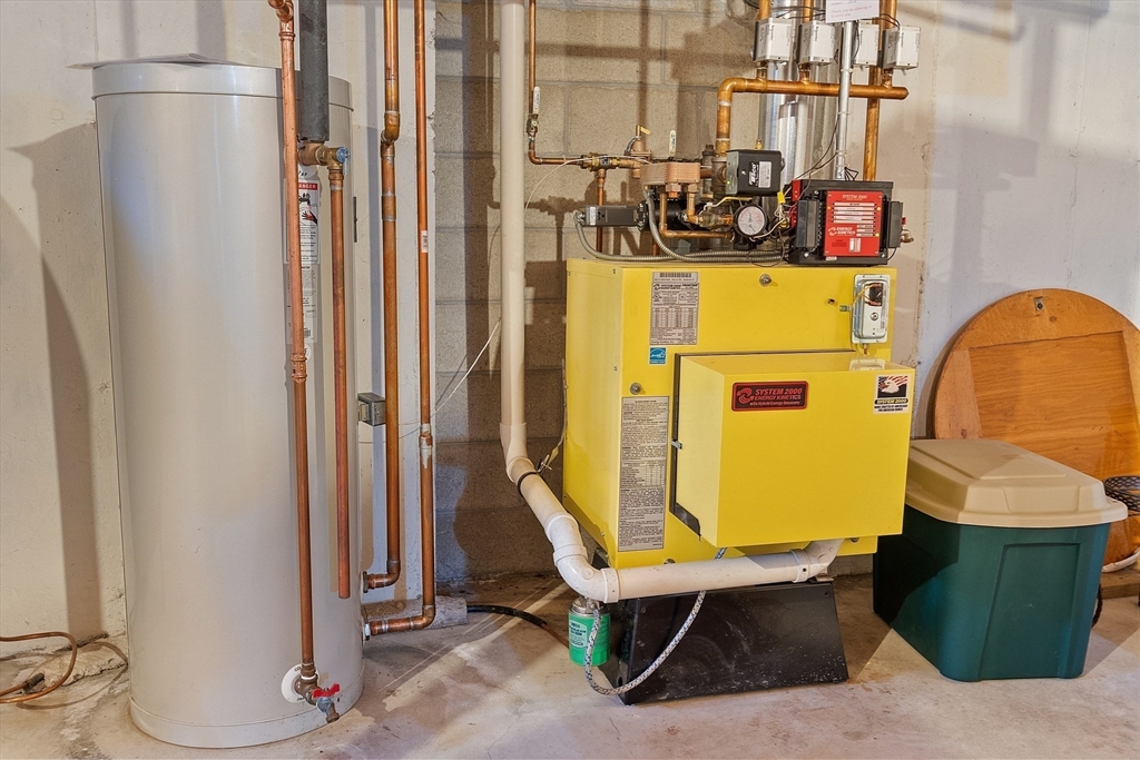 27 Lancaster Road Shirley, MA 01464 - Photo 32 of 41 a room with table and chairs