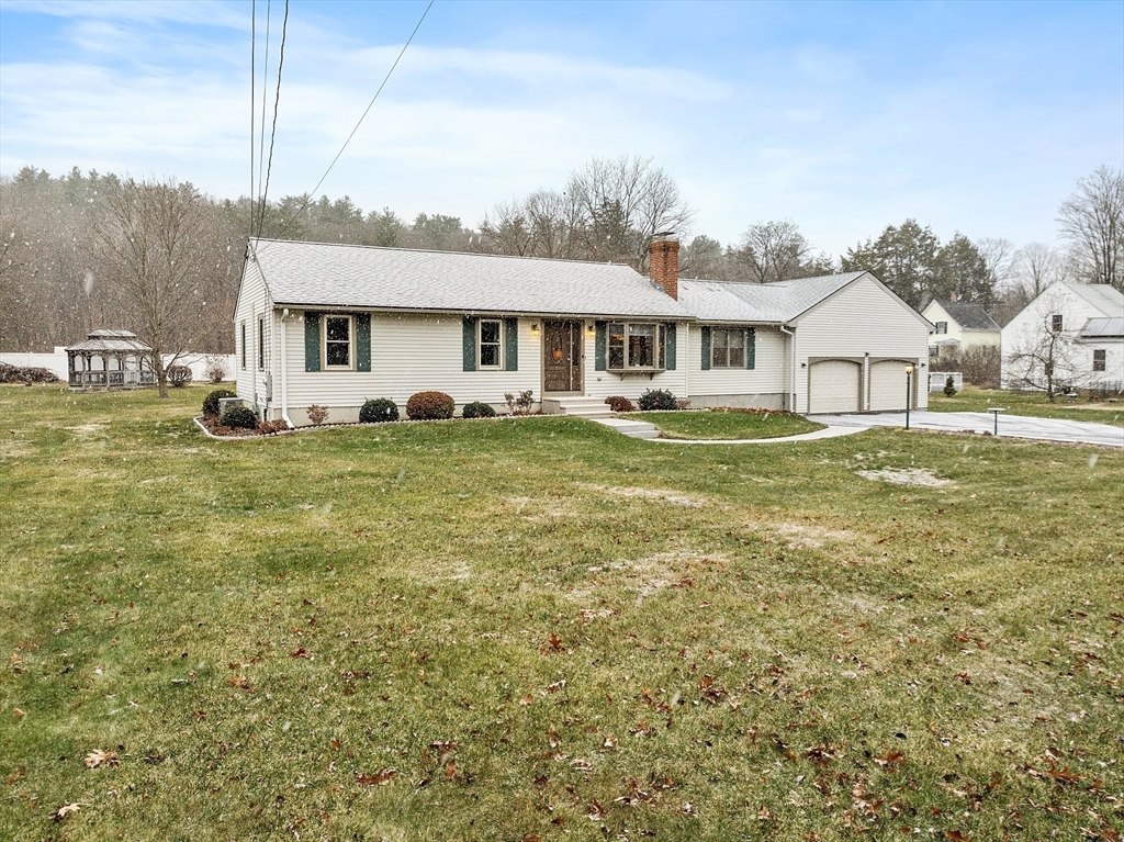 27 Lancaster Road Shirley, MA 01464 - Photo 33 of 41 a house view with a sitting space and garden