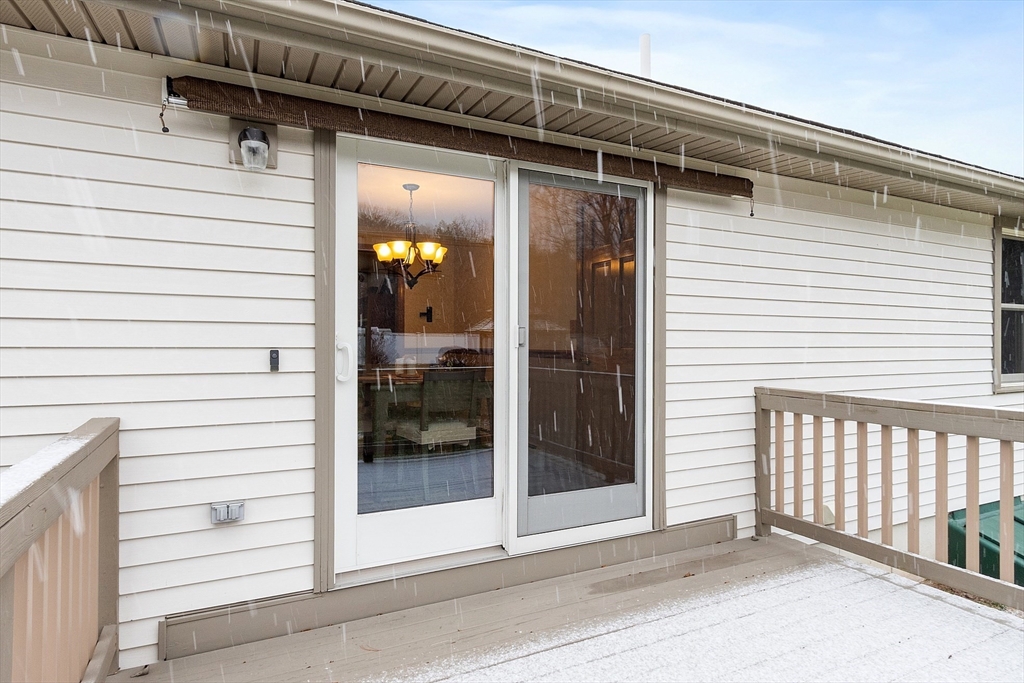 27 Lancaster Road Shirley, MA 01464 - Photo 38 of 41 a view of a porch with a door and a porch