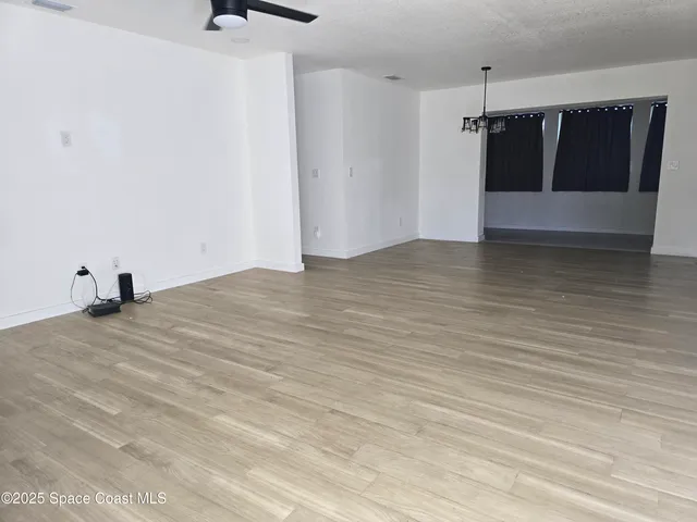 a view of a room with an empty space