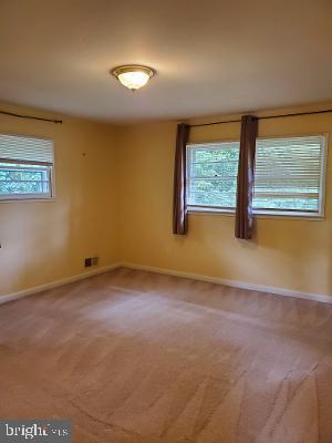 1501 Audmar Drive McLean, VA 22101 - Photo 16 of 24 an empty room with windows