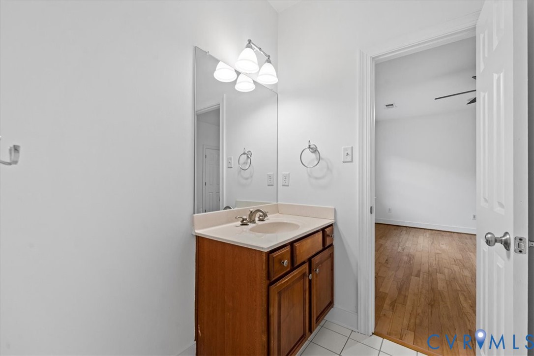 3308 Yarding Way Toano, VA 23168 - Photo 64 of 83 a bathroom with a sink a light fixture and a mirror