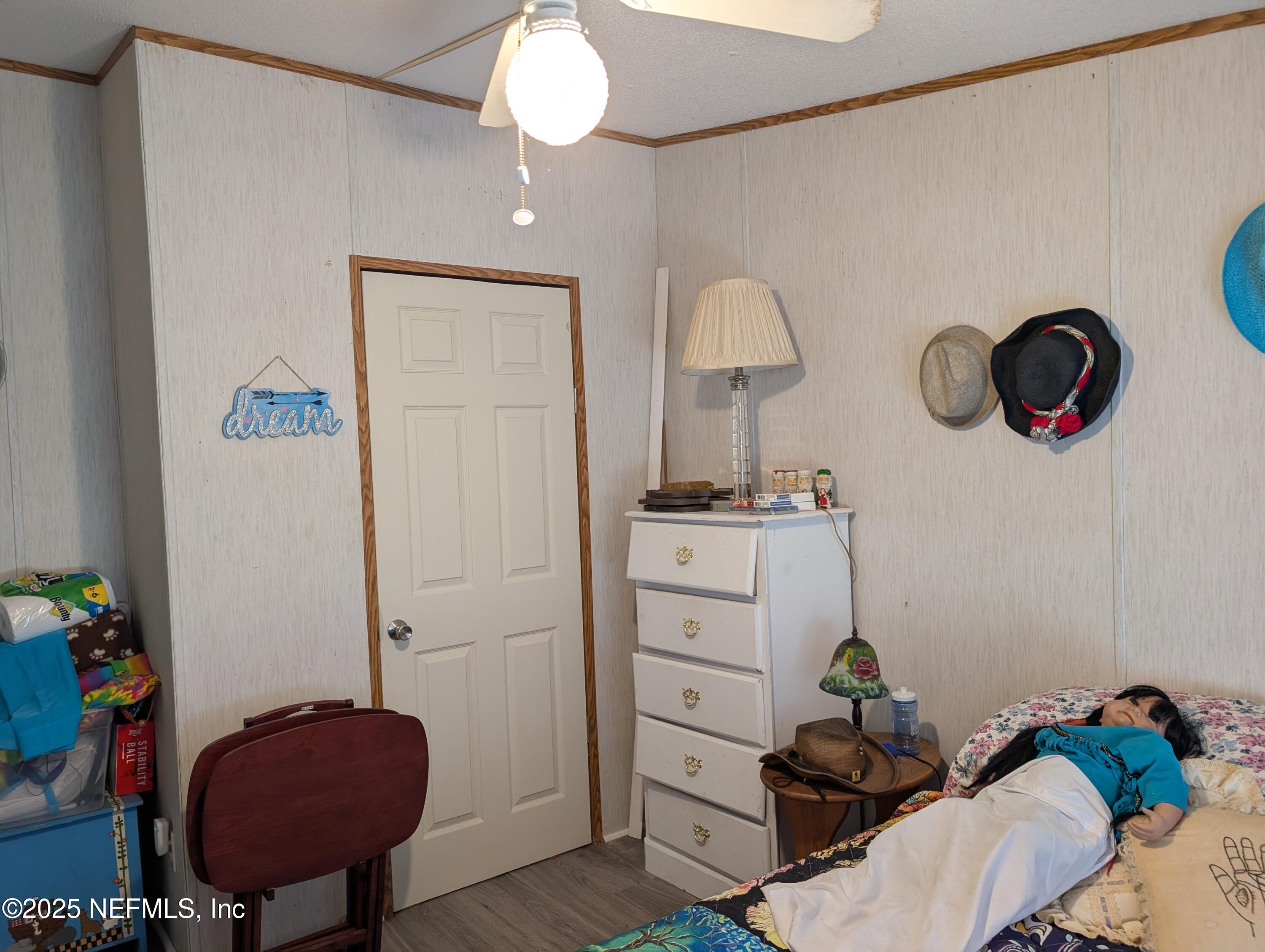 402 Shirley Street Interlachen, FL 32148 - Photo 14 of 20 a view of workspace with furniture and wooden floor
