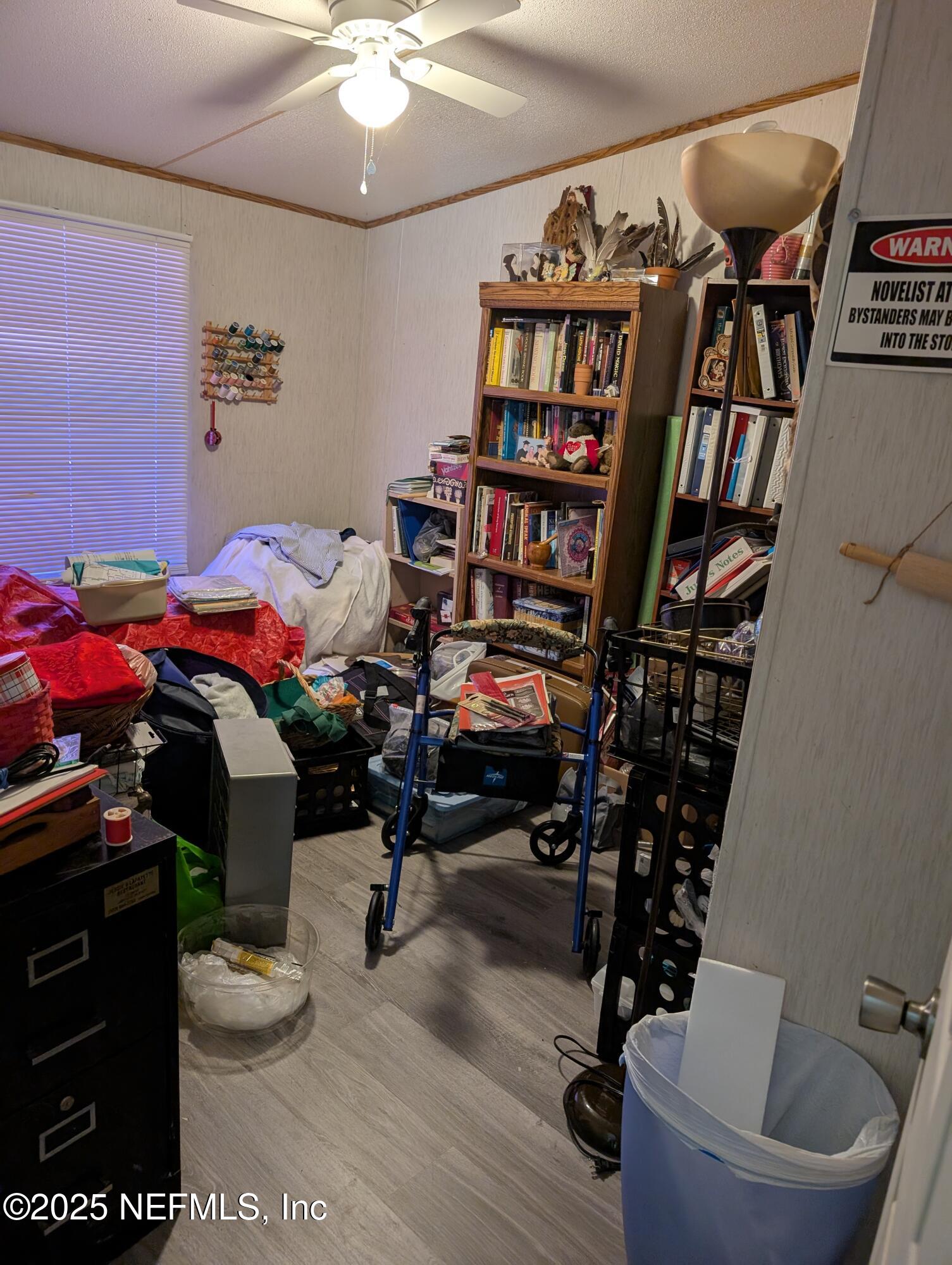 402 Shirley Street Interlachen, FL 32148 - Photo 17 of 20 a view of a workspace with furniture