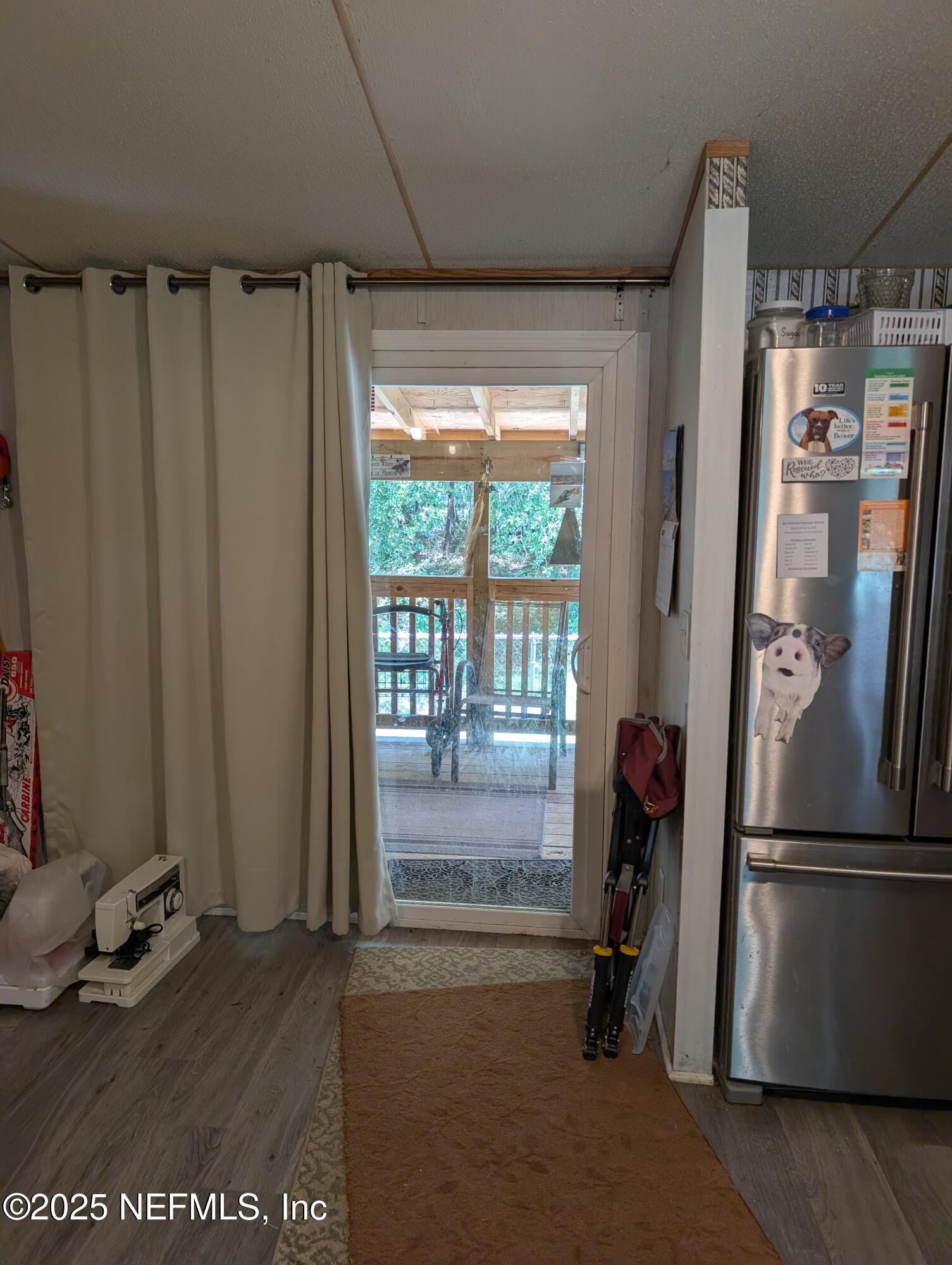 402 Shirley Street Interlachen, FL 32148 - Photo 18 of 20 a room with water heater and a window