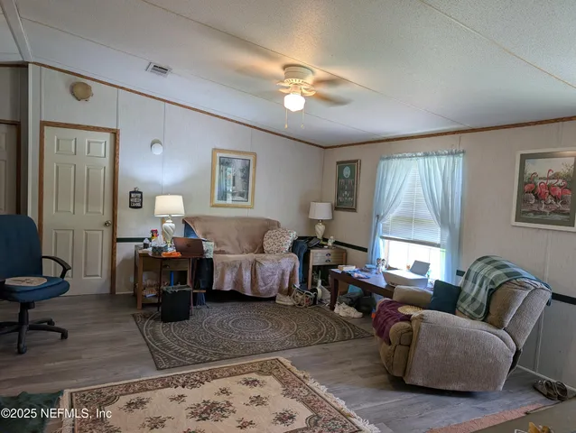 a living room with furniture and a couch