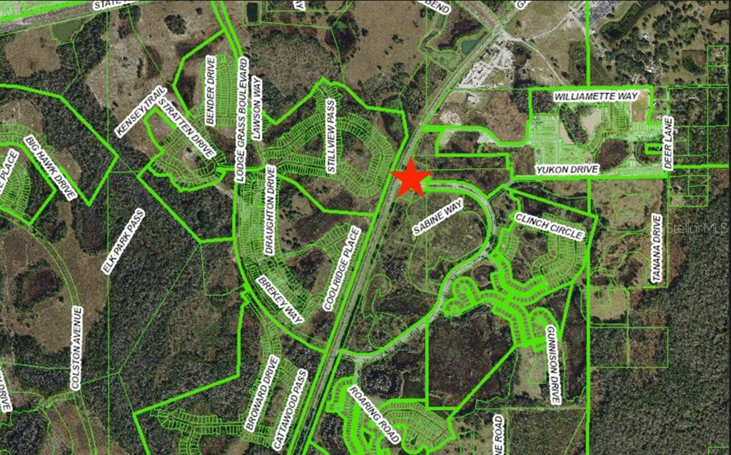 0 North Gall Boulevard, Unit 1 08 ACRES Zephyrhills, FL 33540 - Photo 2 of 27 a backyard of a house with lots of green space