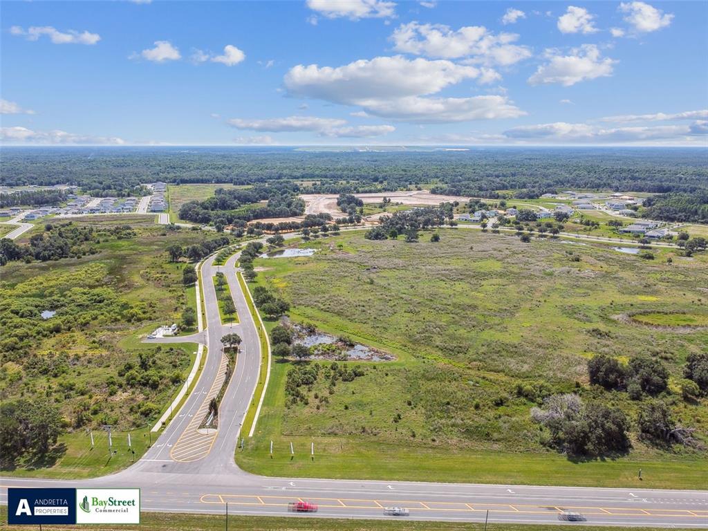 0 North Gall Boulevard, Unit 1 08 ACRES Zephyrhills, FL 33540 - Photo 10 of 27 a view of a swimming pool with a lake view