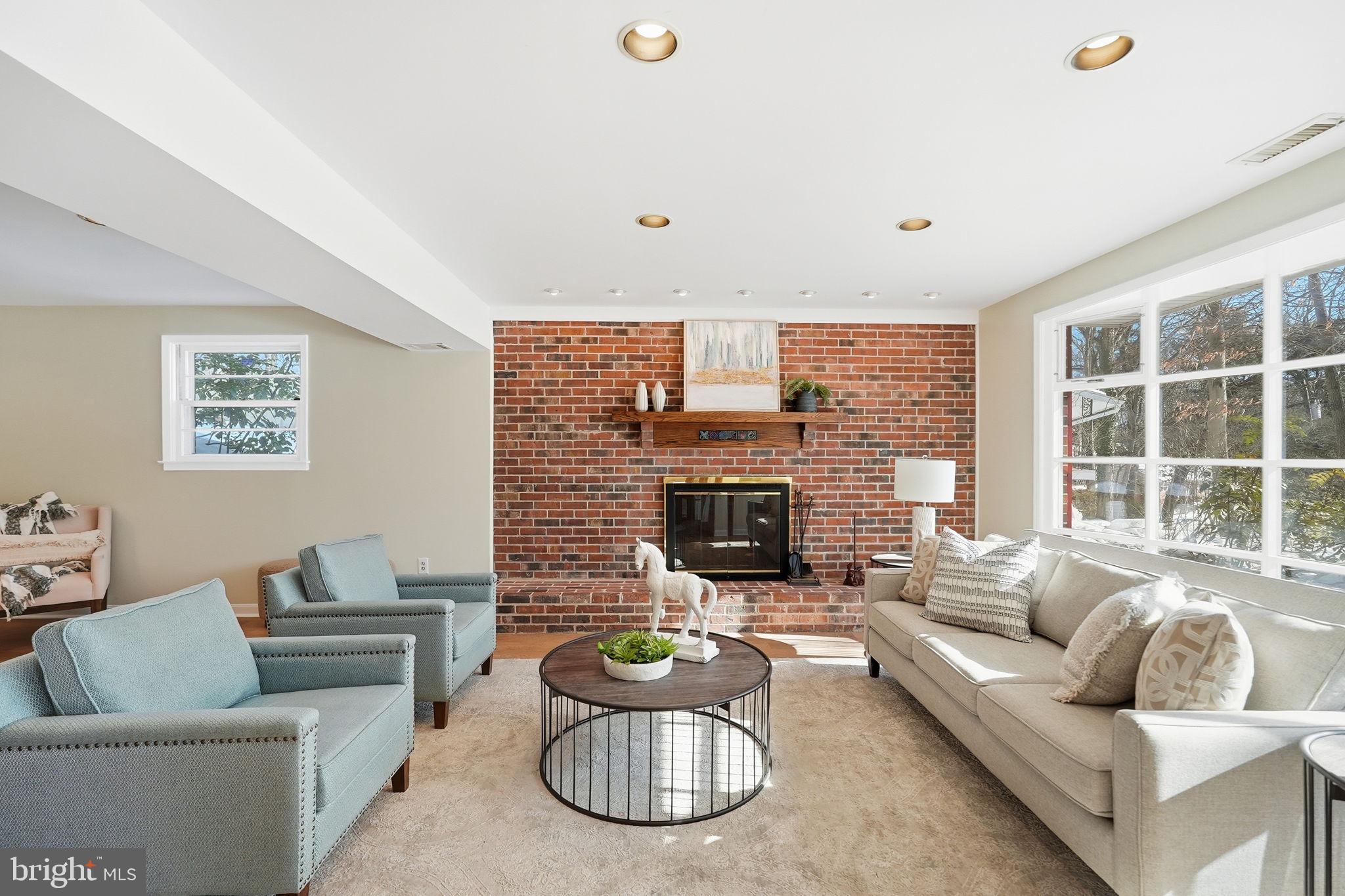 7511 Shadywood Road Bethesda, MD 20817 - Photo 4 of 29 Sun-Filled Family Room w/ Wood Burning Fireplace