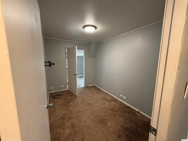 an empty room with closet