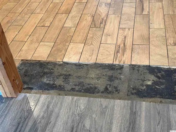 a view of wooden floor with a sink