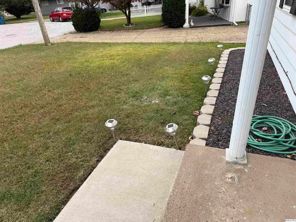 a view of outdoor space and front view of a house