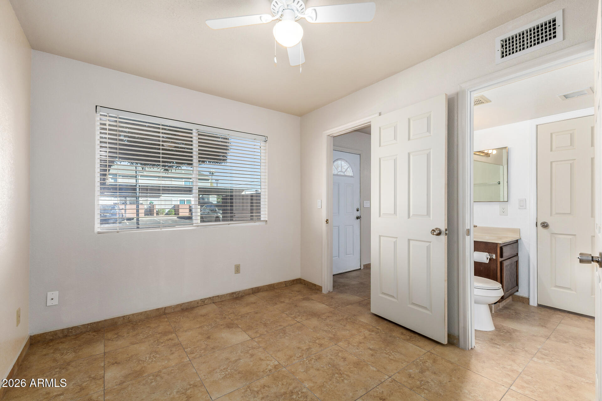 510 North Alma School Road, Unit 159 Mesa, AZ 85201 - Photo 19 of 31 a view of an empty room with a window