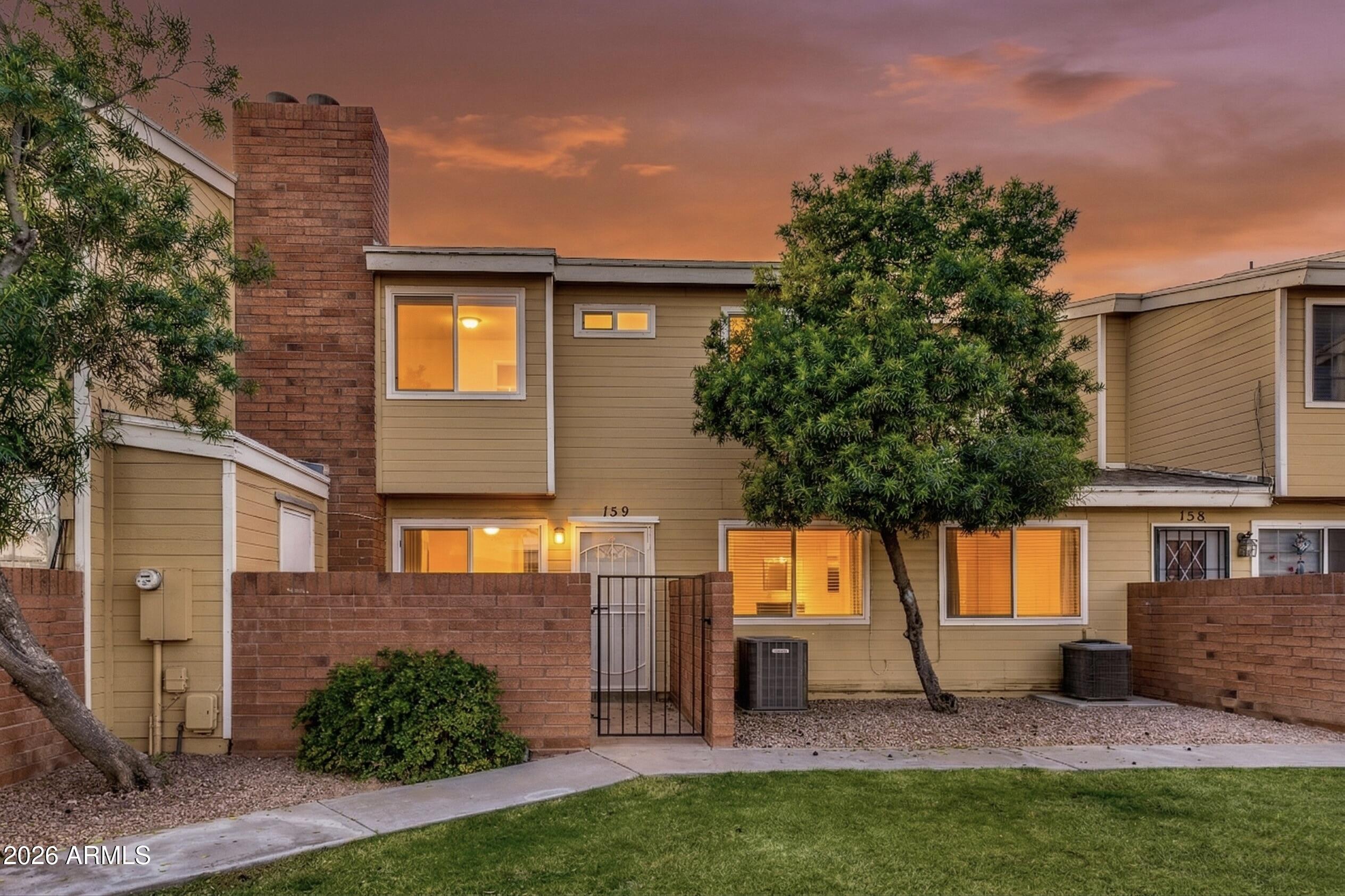 510 North Alma School Road, Unit 159 Mesa, AZ 85201 - Photo 31 of 31 a backyard of a house with seating space