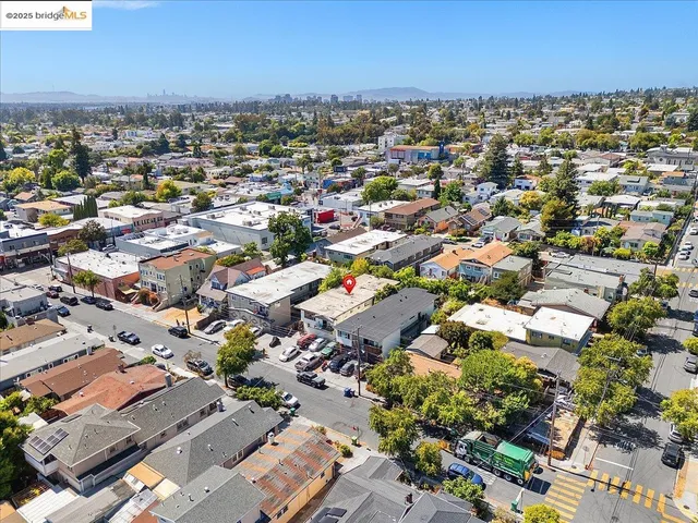 an aerial view of a city with lots of residential buildings