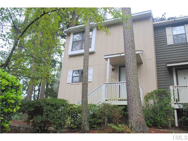 5745 3 Oaks Drive Raleigh, NC 27612 - Photo 1 of 12 a front view of a house with a yard