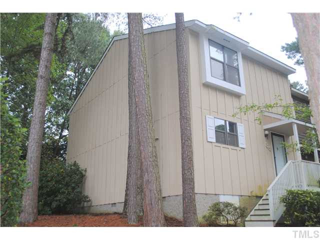 5745 3 Oaks Drive Raleigh, NC 27612 - Photo 2 of 12 a view of a house with backyard and garden