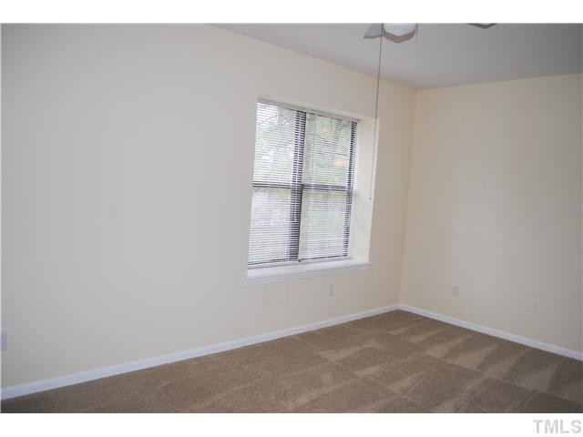 5745 3 Oaks Drive Raleigh, NC 27612 - Photo 9 of 12 view of an empty room with a window