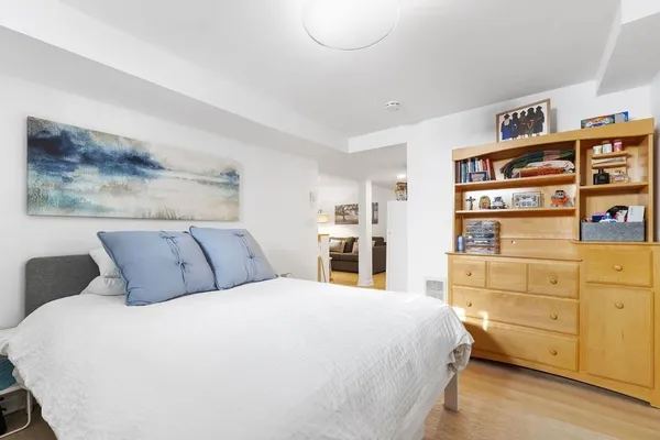a bed room with a bed and a closet