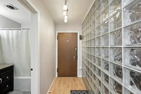 a view of a hallway with closet