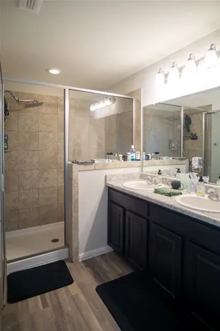 a bathroom with a sink and a mirror