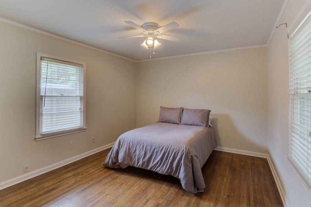 4811 Mockingbird Lane Memphis, TN 38117 - Photo 15 of 19 a bedroom with a bed and a window