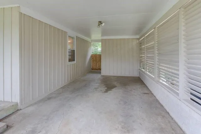 a view of a deck with a backyard