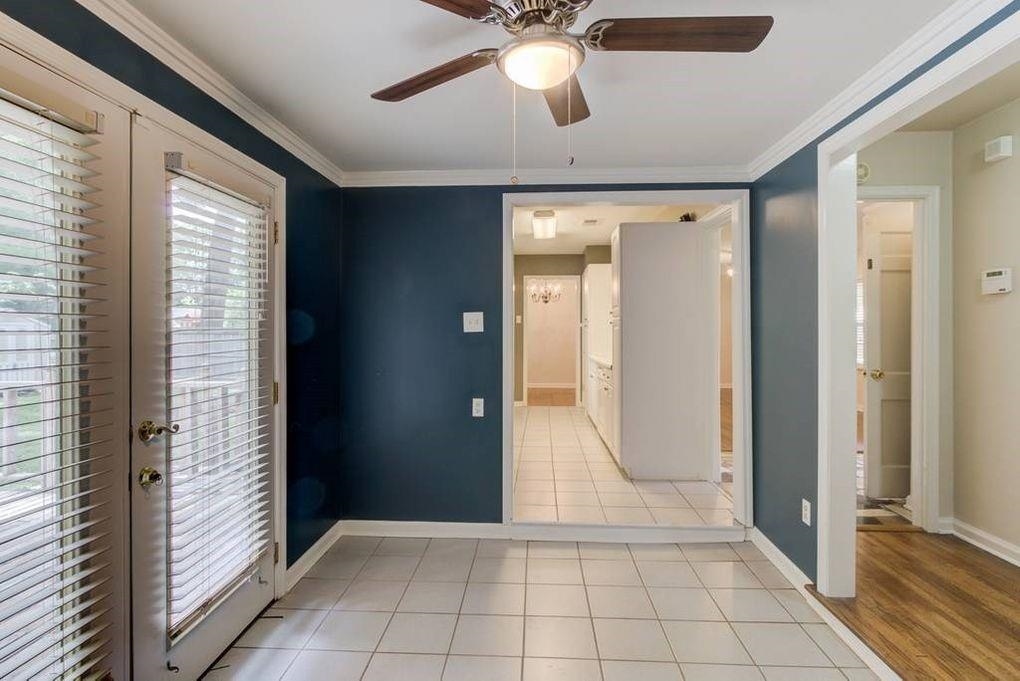 4811 Mockingbird Lane Memphis, TN 38117 - Photo 8 of 19 a view of an entryway with a chandelier fan