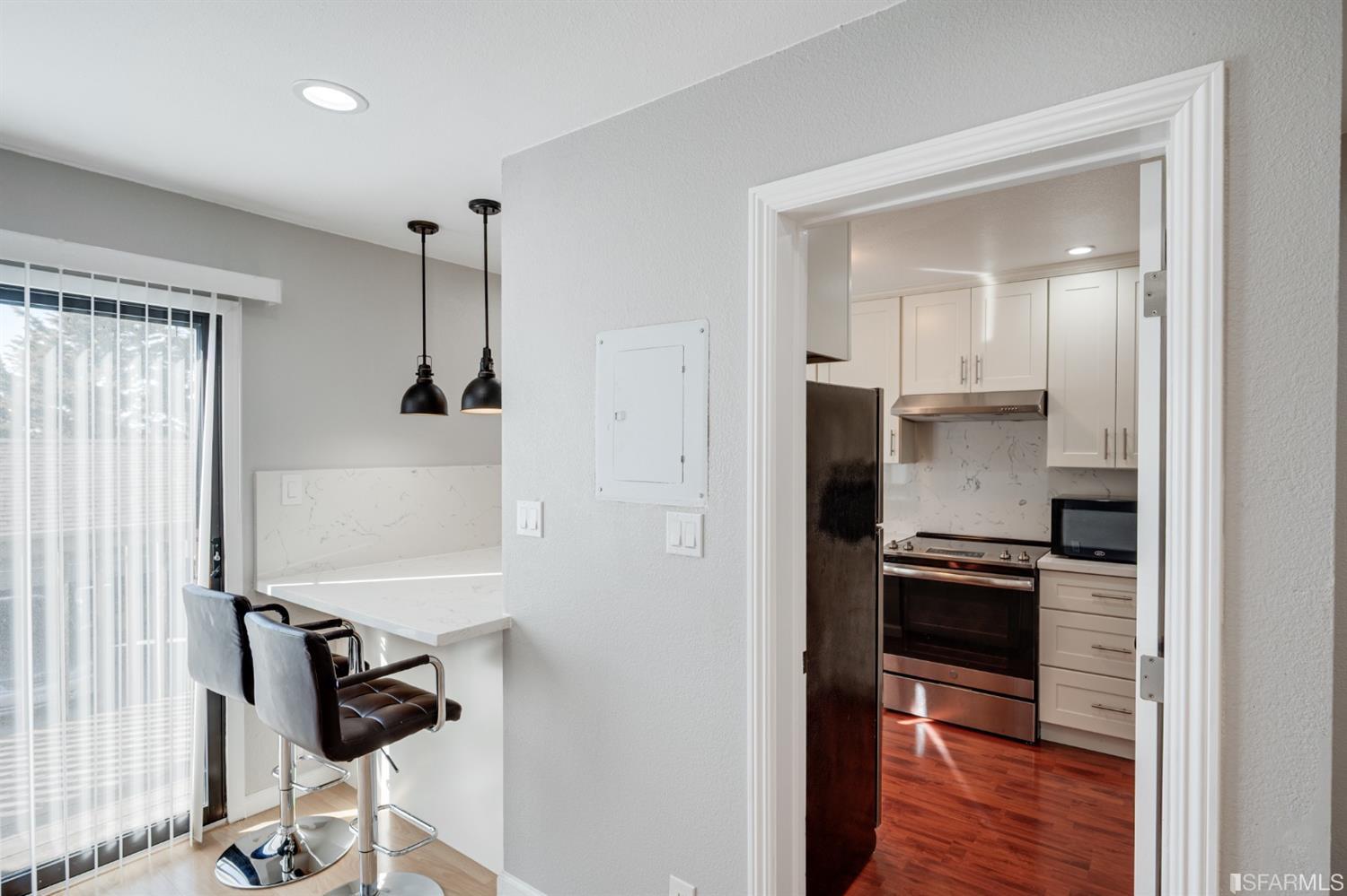 511 King Drive, Unit 5 Daly City, CA 94015 - Photo 19 of 51 a kitchen with a refrigerator and a stove top oven