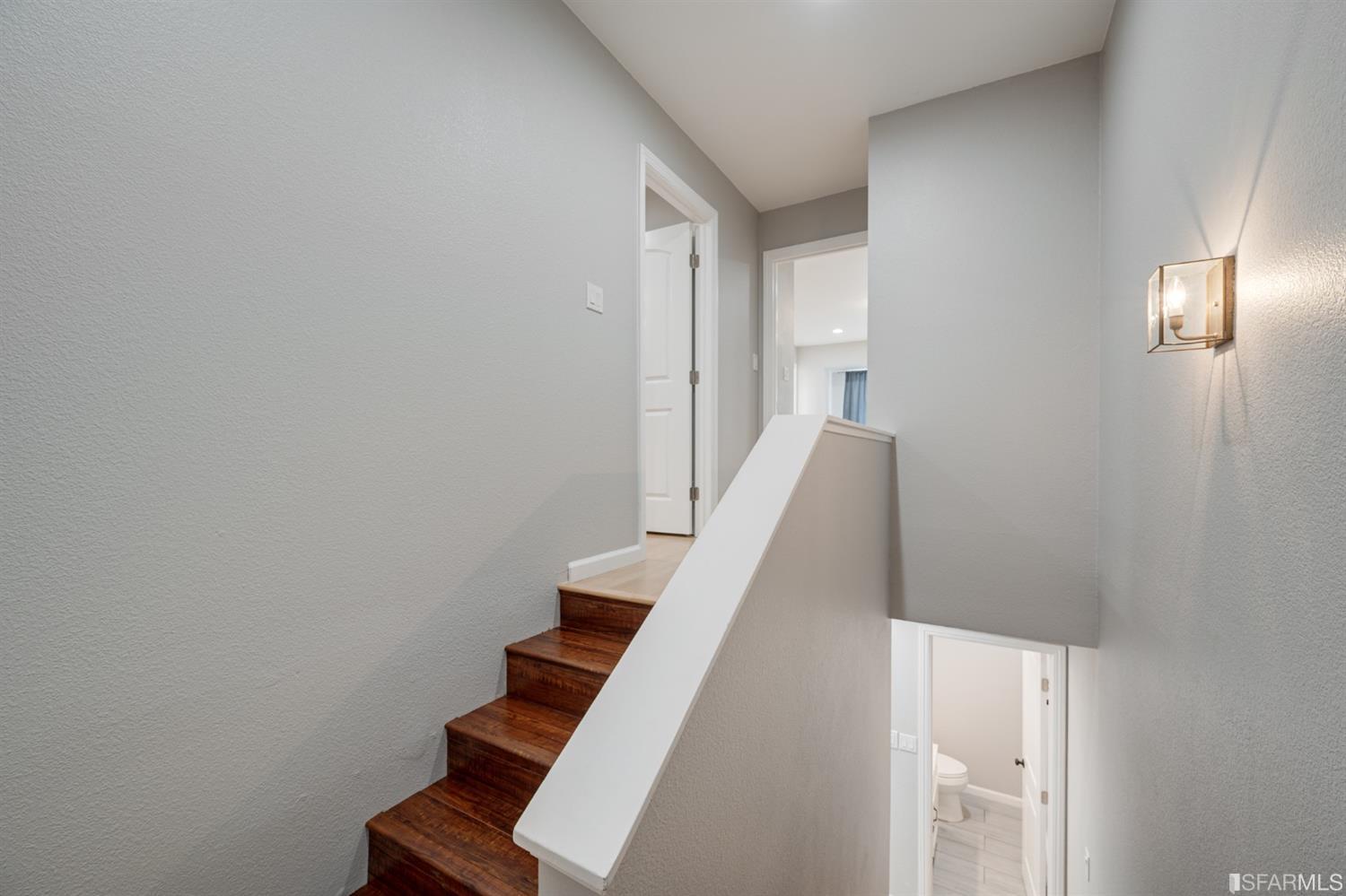511 King Drive, Unit 5 Daly City, CA 94015 - Photo 27 of 51 a view of staircase with wooden floor
