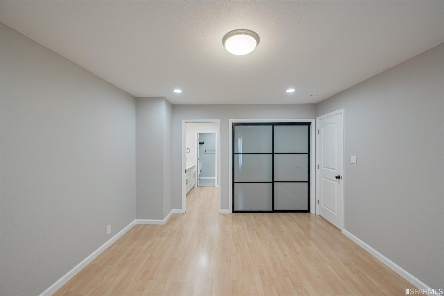 511 King Drive, Unit 5 Daly City, CA 94015 - Photo 32 of 51 wooden floor in an empty room with a window