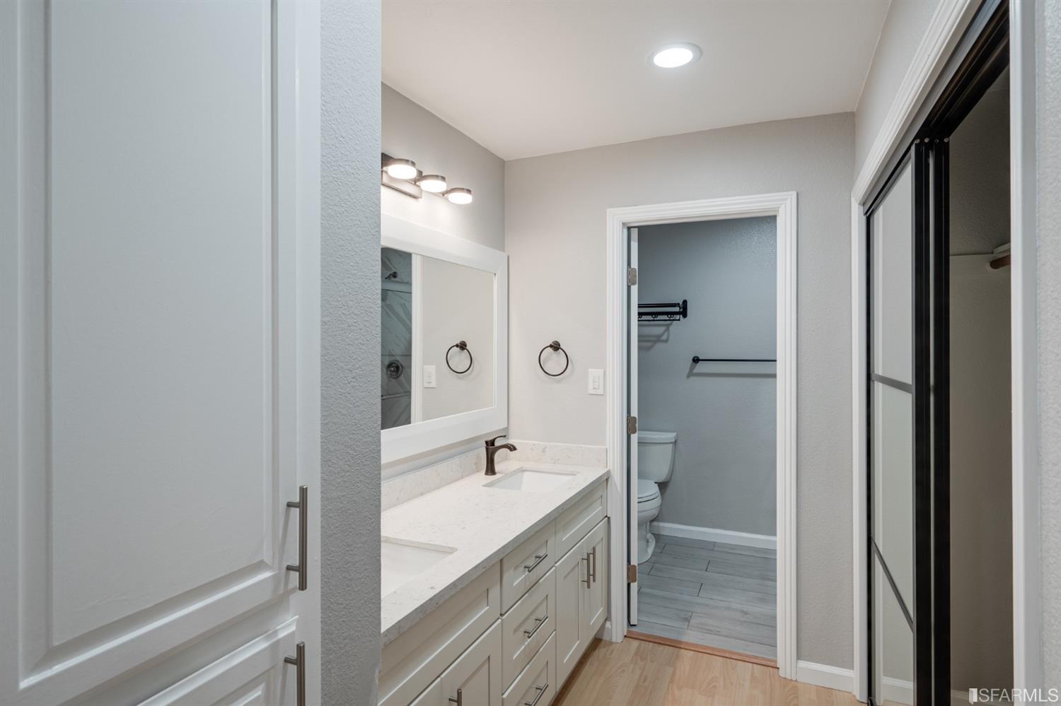 511 King Drive, Unit 5 Daly City, CA 94015 - Photo 33 of 51 a spacious bathroom with a double vanity sink a mirror and a shower