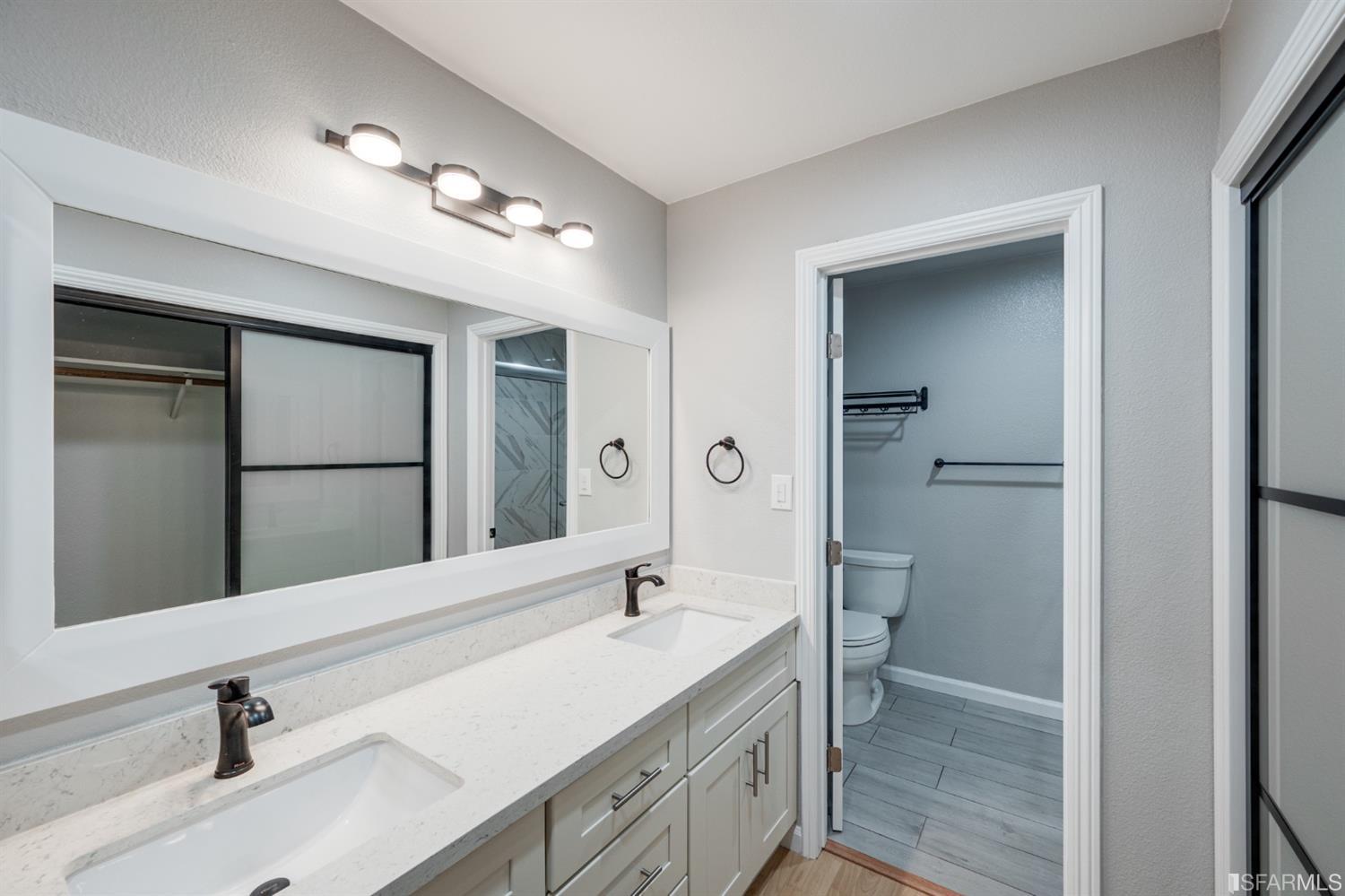 511 King Drive, Unit 5 Daly City, CA 94015 - Photo 35 of 51 a bathroom with a double vanity sink mirror and double