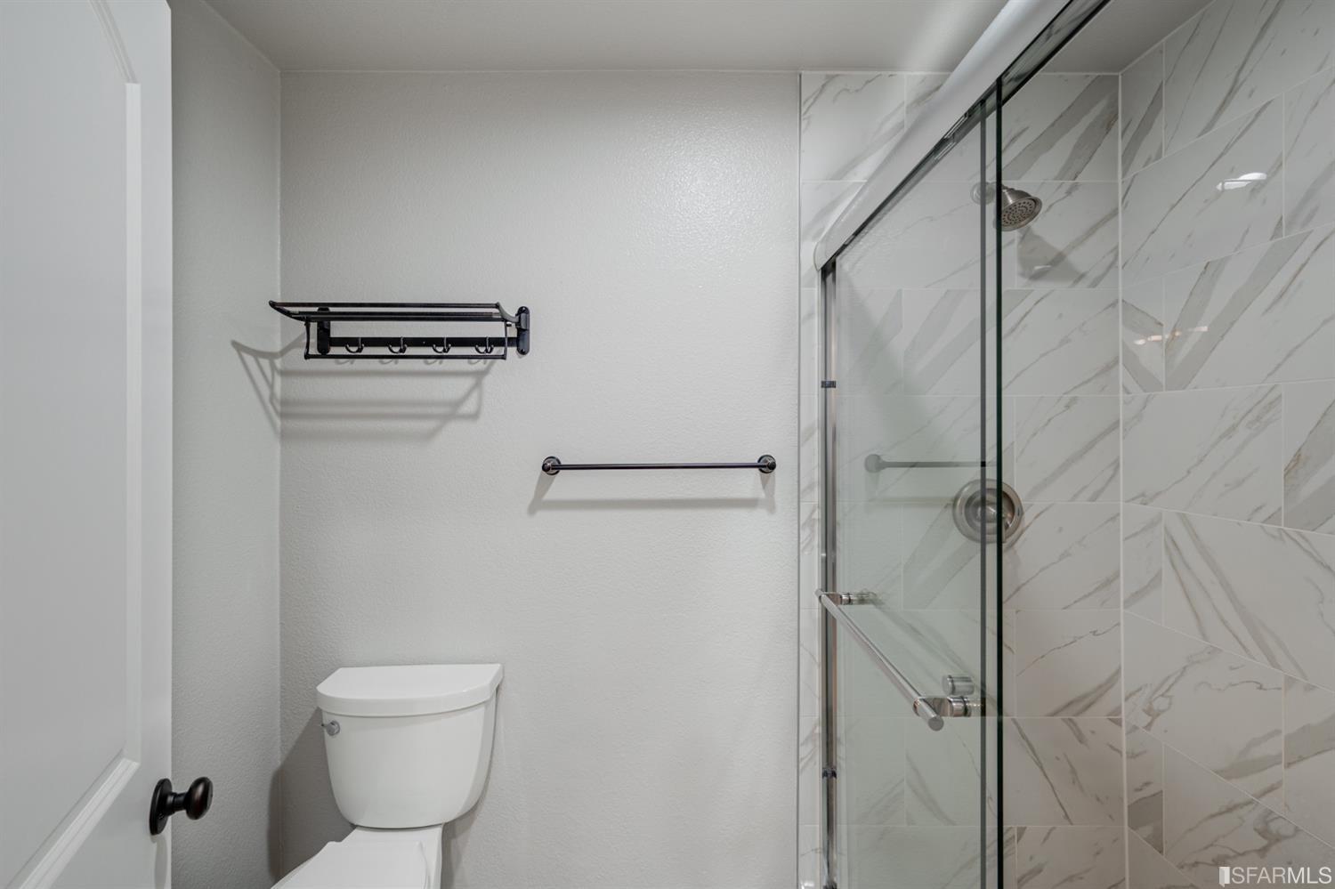 511 King Drive, Unit 5 Daly City, CA 94015 - Photo 36 of 51 a bathroom with a toilet and a shower