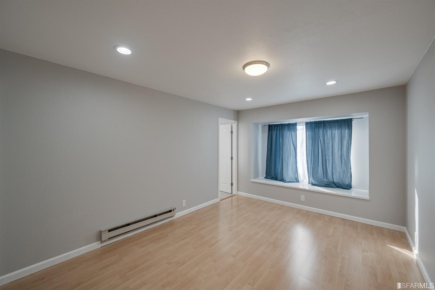 511 King Drive, Unit 5 Daly City, CA 94015 - Photo 41 of 51 an empty room with windows and closet