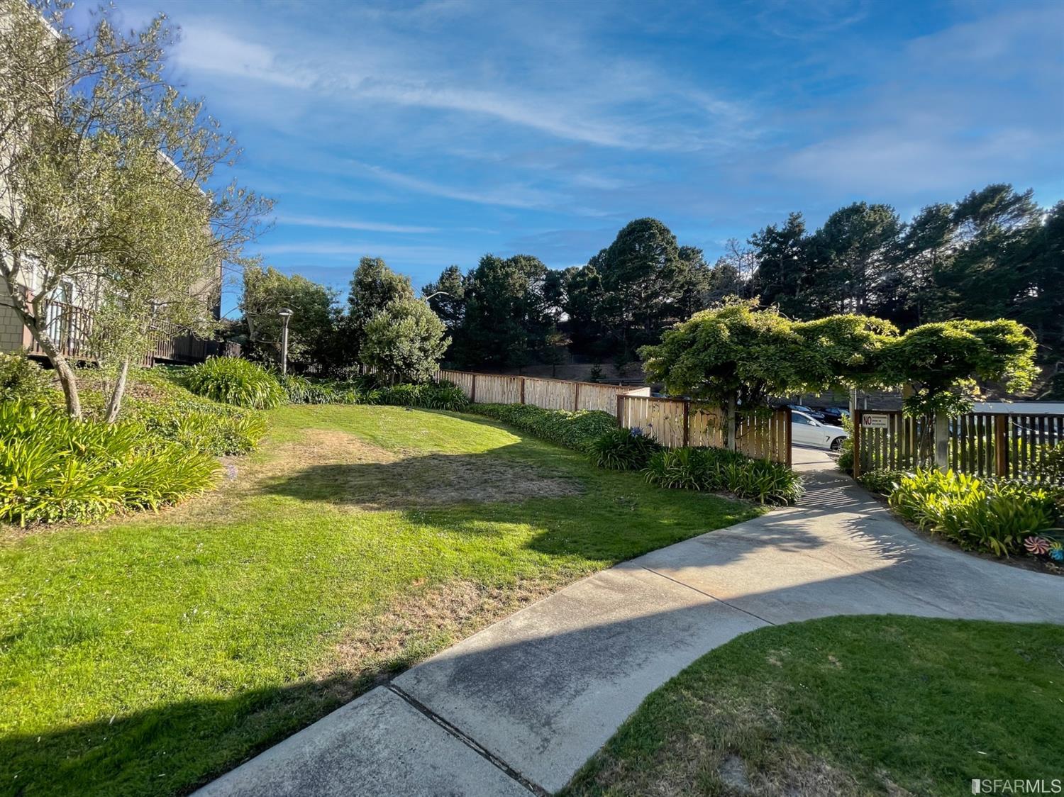 511 King Drive, Unit 5 Daly City, CA 94015 - Photo 51 of 51 a view of a garden with a building in the background