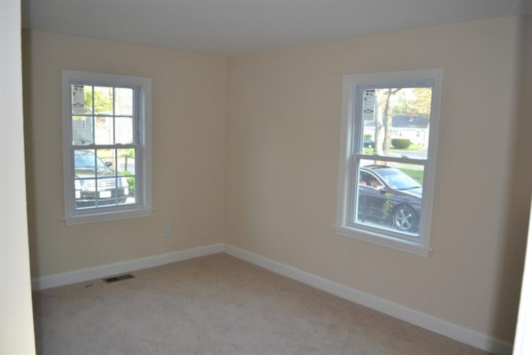 17 Wolley Road Hyannis, MA 02601 - Photo 2 of 11 an empty room with a window